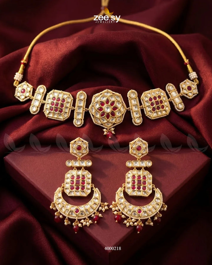 Amber pearl drop necklace set featuring elegant gold-toned chain and matching earrings, perfect for special occasions.