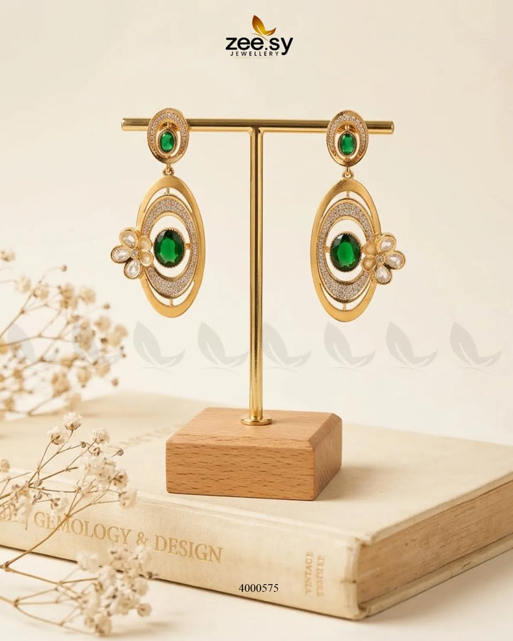 Ameera gemstone drop earrings with vibrant green stones set in silver, featuring elegant dangle design for women.