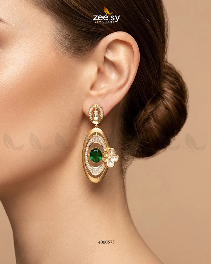 Ameera gemstone drop earrings by RHS09 featuring vibrant green gemstones and elegant gold hooks.