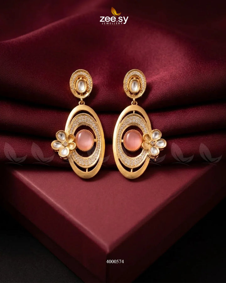 A pair of RHS09 Ameera gemstone drop earrings featuring mint and pink gemstones with elegant gold hooks.