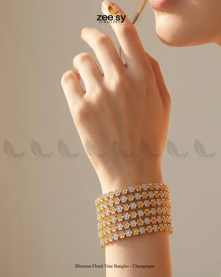 Champagne Blossom Floral Vine Bangles by RHS09, elegant jewelry with intricate floral design on shiny bangles.