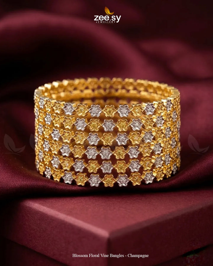 Champagne-colored Blossom Floral Vine bangles by RHS09 featuring intricate floral designs in a stylish bracelet set.