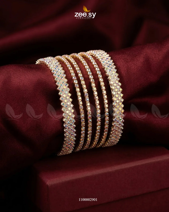 AJ03 Celestia Prism Crystal Bangle showcasing dazzling multicolor crystals on a sleek silver-toned bangle.