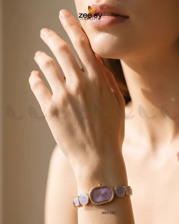 Elegant pastel purple wrist watch by AJ03, featuring a sleek design and a comfortable strap, perfect for accessories.