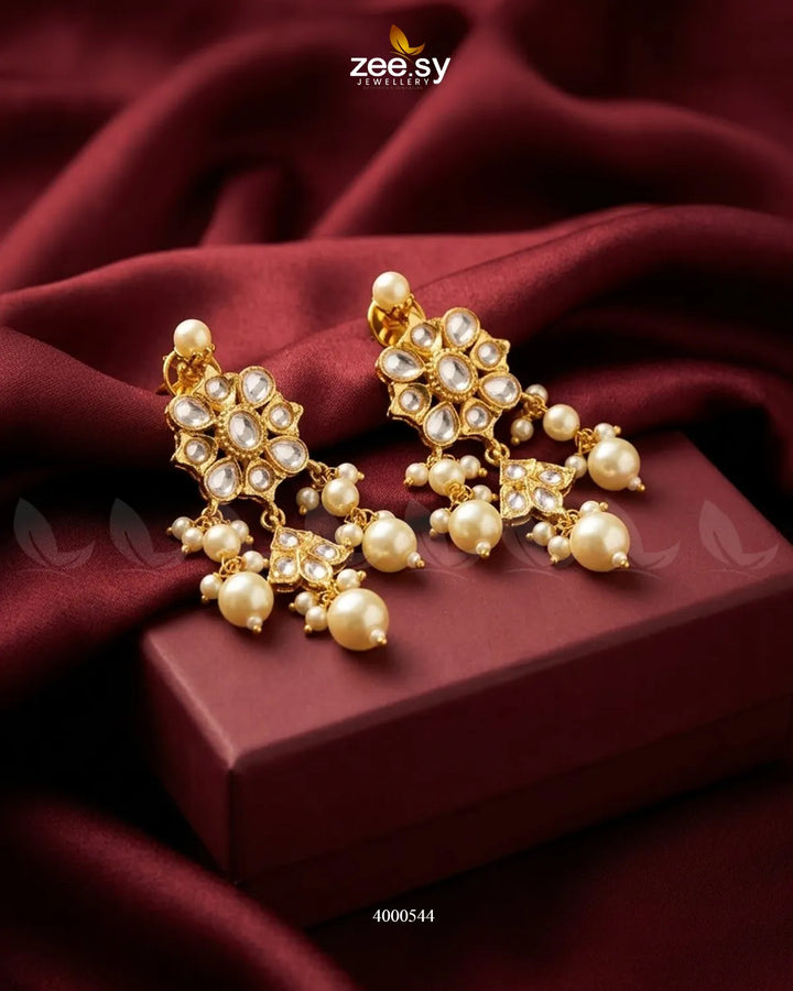 RHS09 Garima floral cluster pearl earrings with intricate floral design and dangling pearls on silver hooks.