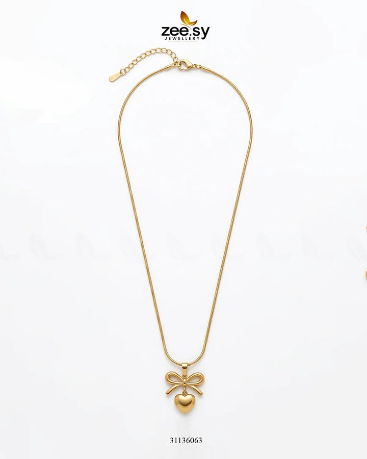 Puffed Heart Ribbon Bow Pendant Pendant - Zeesy Jewellery Pakistan | Premium Artificial & Imitation Jewellery