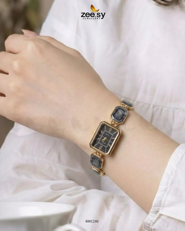 Black retro square dial watch from AJ03 with a classic design, showcasing the vintage-inspired accessories in the image.