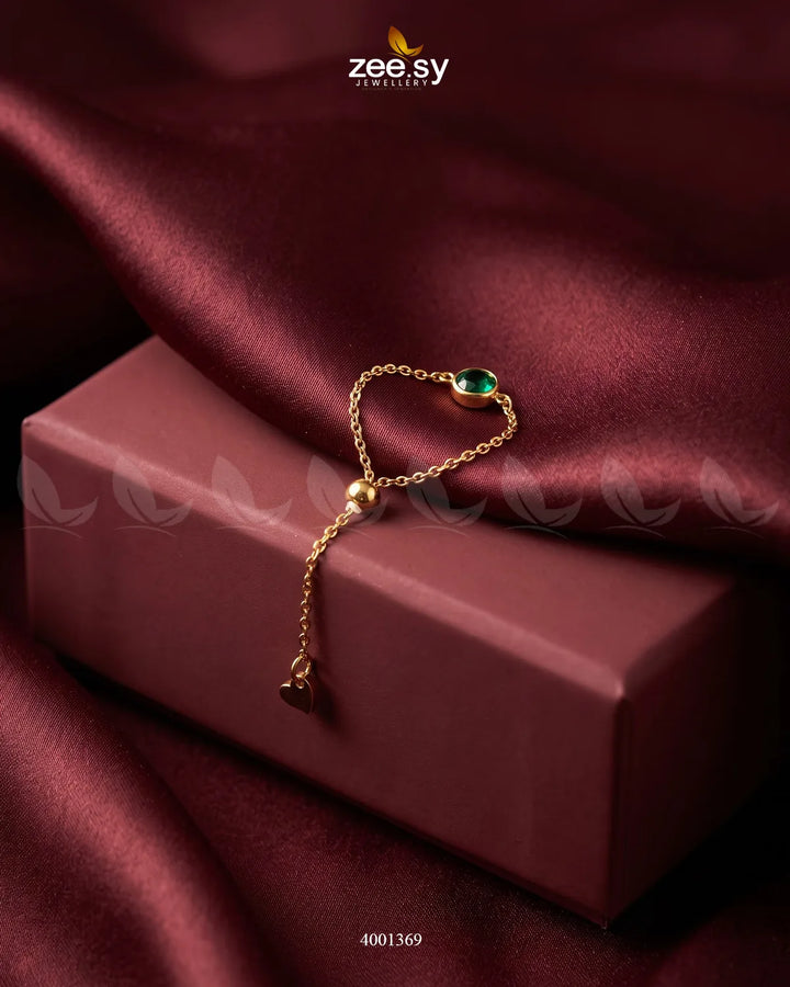 Green scarlet round stone finger ring by AJ03, showcasing a stylish band with a vibrant, polished gemstone.