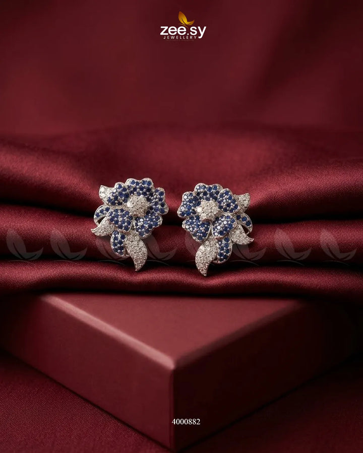 RHS09 sparkling American diamond earrings in silver with blue accents