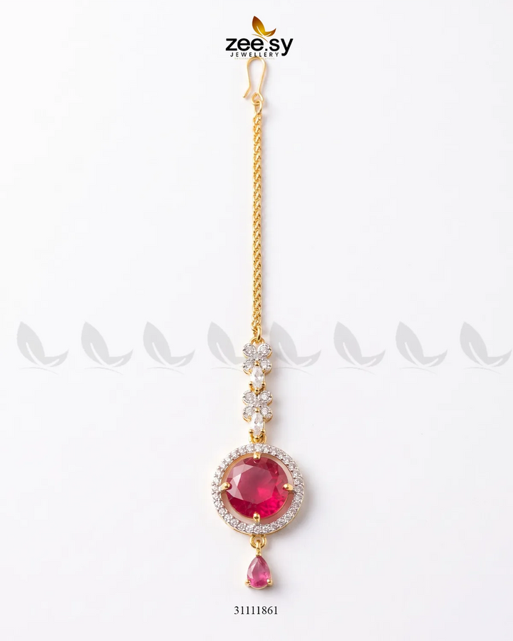 Fuchsia Talia Bindiya from RHS09 featuring intricate design, perfect for traditional Indian jewelry and bindi accessories.