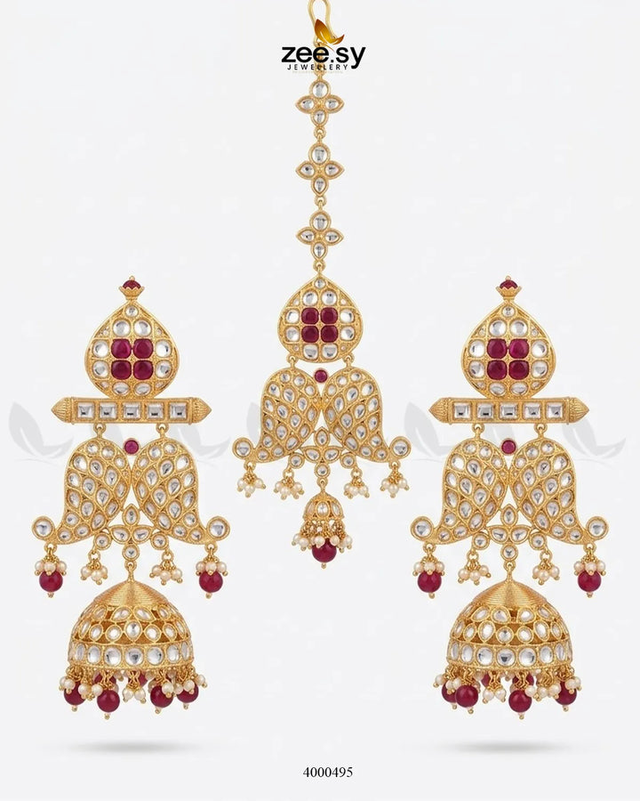 Traditional Polki Jhumki earrings with intricate gold detailing and dangling pearl accents, handcrafted by RHS09.