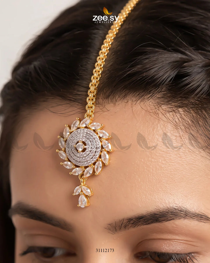 White Zayna Bindiya from RHS09, traditional decorative forehead bindiya with intricate design, perfect for festive or cultural wear.
