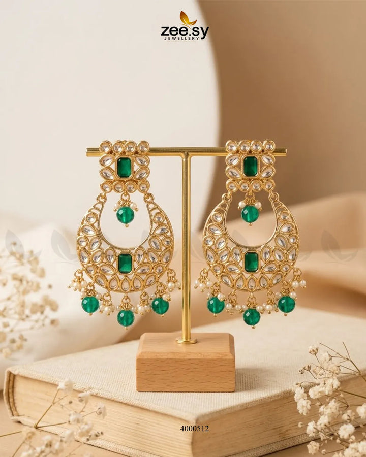 A pair of RHS09 Afsana square stone kundan earrings with intricate design and sparkling stones on a white background.