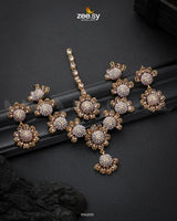 Alstroemeria Necklace Set, An exquisite ensemble featuring delicate flower motifs adorned with intricate embellishments and dazzling crystal glass stones. The finely crafted details create a perfect blend of elegance and sophistication, making it an ideal choice for any grand occasion. Elevate your look with this timeless statement piece that radiates charm and grace.