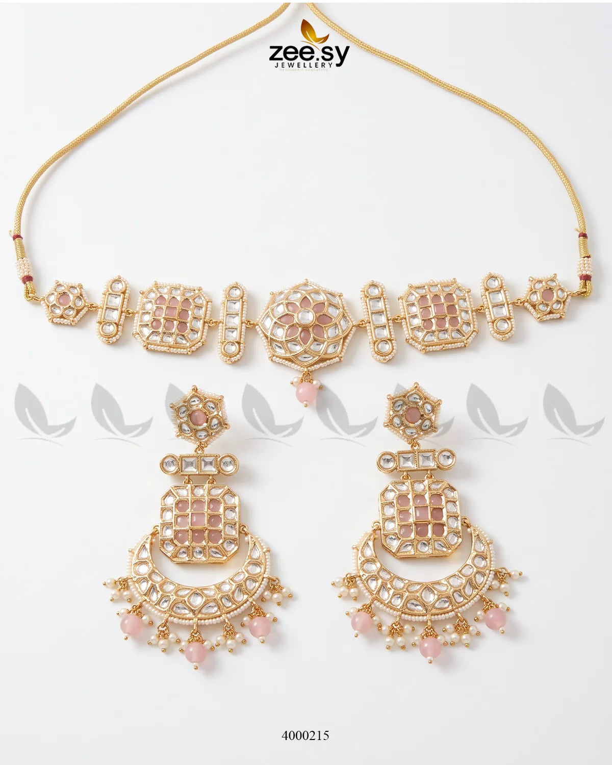 Amber pearl drop necklace set featuring mint pink accents, showcasing elegant jewelry with dangling pearl drops and intricate design.