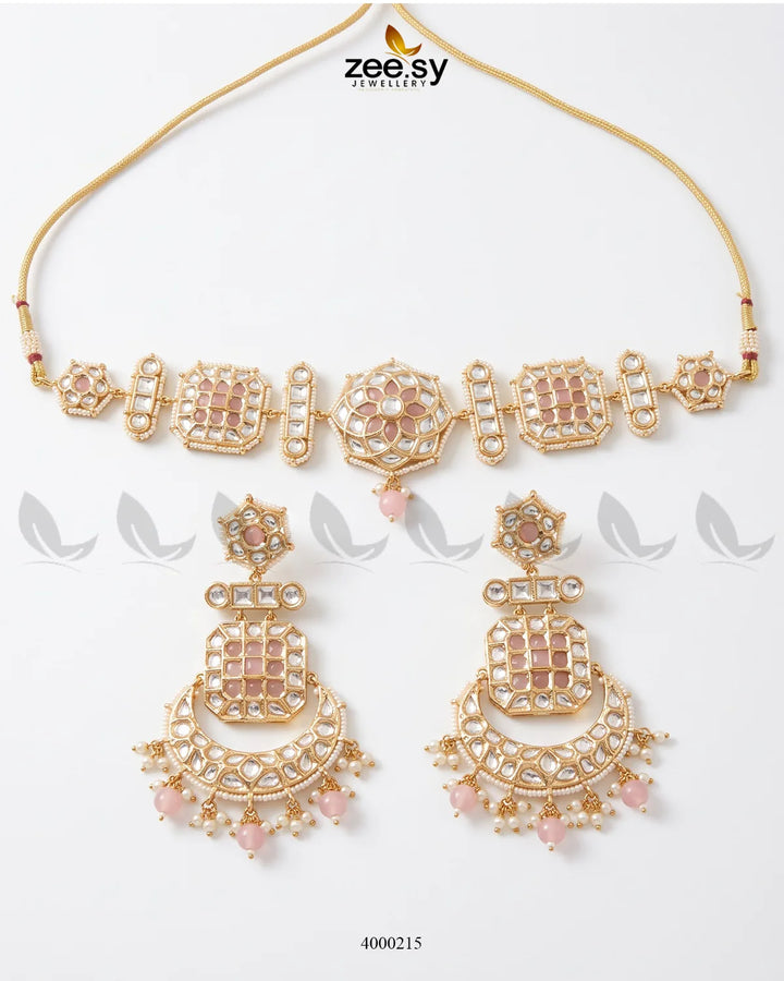 Amber pearl drop necklace set featuring mint pink accents, showcasing elegant jewelry with dangling pearl drops and intricate design.