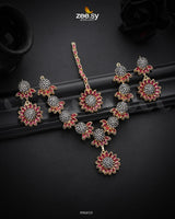 Aquilegia Necklace Set, a captivating floral-inspired design that blends modern elegance with traditional charm. Each intricately detailed flower motif is adorned with dazzling crystal glass stones, creating a striking contrast and luxurious appeal. Perfect for special occasions, this exquisite piece adds a radiant touch to any look.