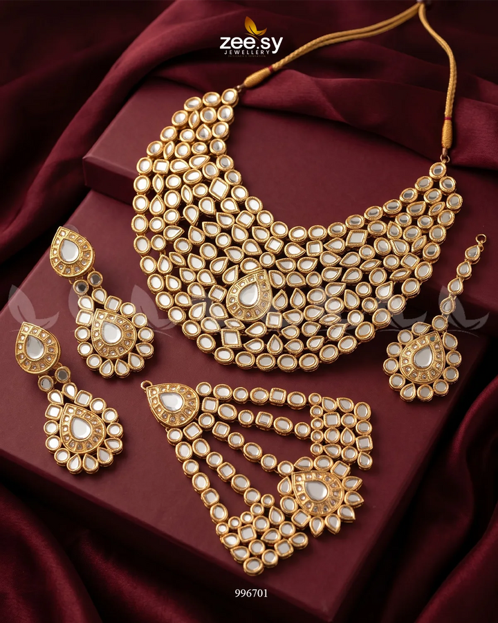 KW06 Azalea bridal set featuring a coordinated engagement ring and wedding band with sparkling stones
