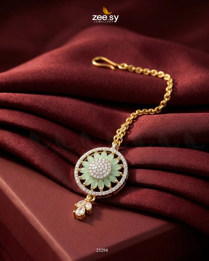 Indigo Wheel Crystal Bindiya Golden Mint Green bindiya - Zeesy Jewellery Pakistan | Premium Artificial & Imitation Jewellery