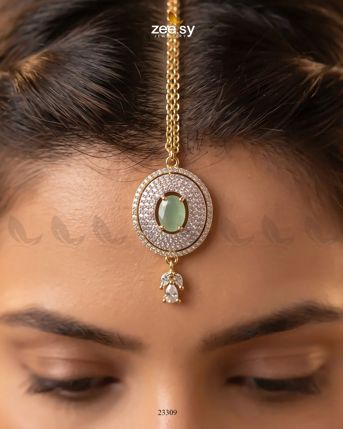 Mint green bindiya with floral design from RHS09, featuring delicate decorative elements on a white background.