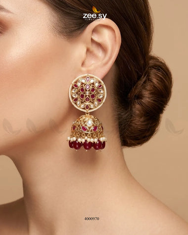 Elegant circular pearl and kundan jhumkas earrings with intricate design, featuring traditional craftsmanship by RHS09.