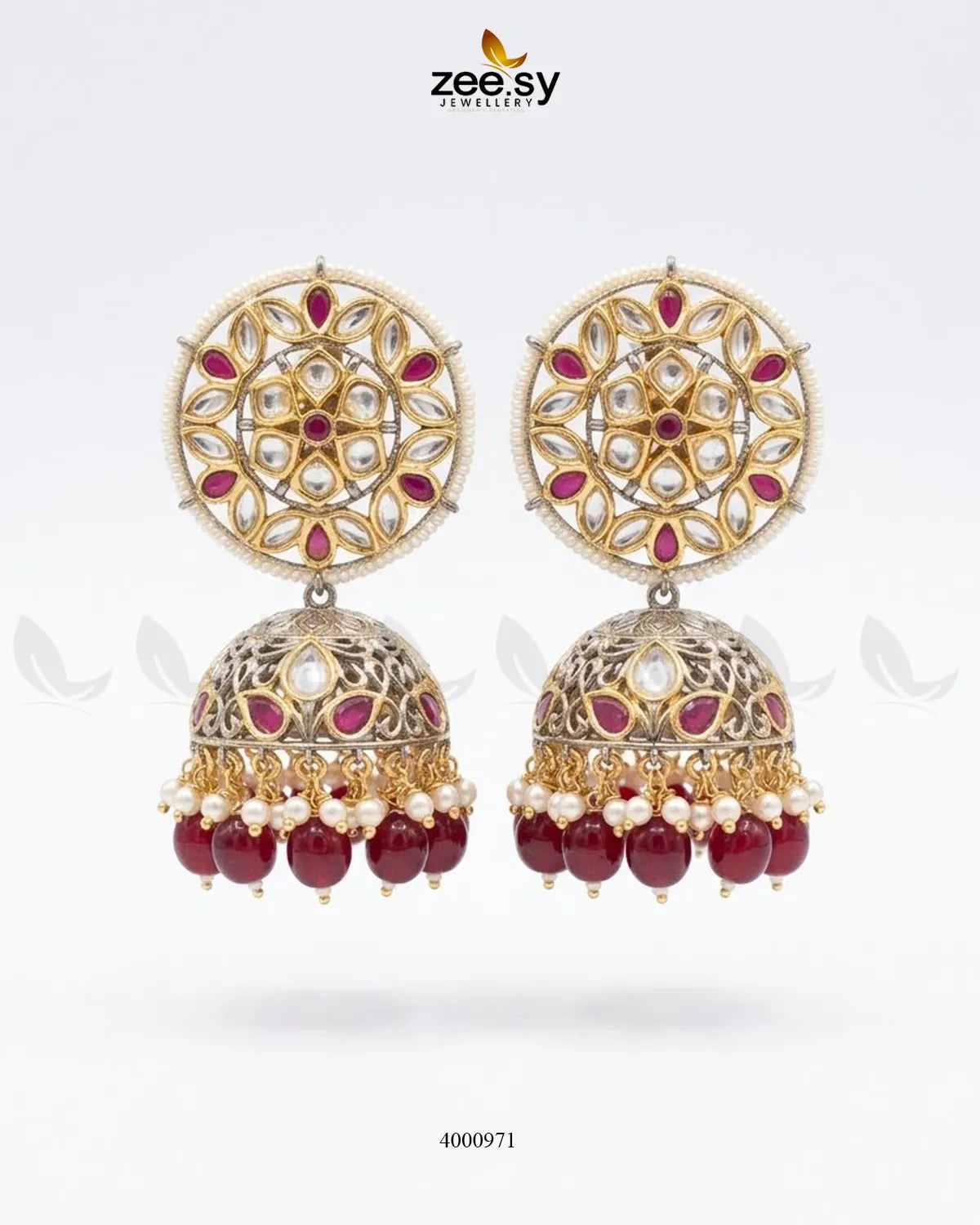 Circular pearl and kundan jhumkas earrings with intricate gold detailing, designed by RHS09.