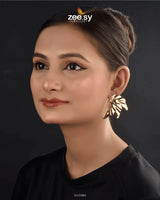 Elviora Earrings exude charm and elegance with their intricate detailing and graceful silhouette. Crafted from high-quality stainless steel, these Leaf Stud Earrings offer durability with a lustrous, tarnish-resistant finish. Designed as Ear Climbers, their sleek yet artistic structure blends modern sophistication with classic allure, making them perfect for both everyday wear and special occasions.