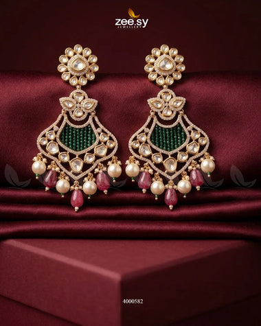 Red floral beaded statement dangler earrings by RHS09 with intricate floral designs and hanging bead details.