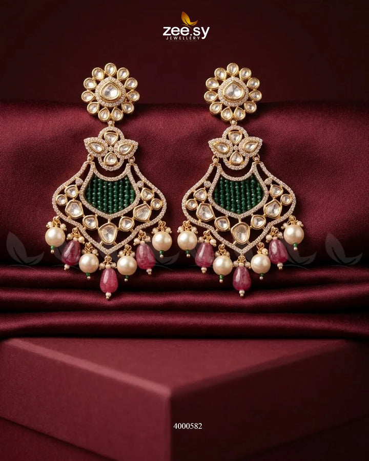Red floral beaded statement dangler earrings by RHS09 with intricate floral designs and hanging bead details.