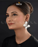 Fluttera Earrings exude charm and elegance with their intricate detailing and graceful silhouette. Crafted from high-quality stainless steel, these&nbsp;Butterfly Studs&nbsp;offer durability with a lustrous, tarnish-resistant finish. Designed as&nbsp;Ear Climbers, their sleek yet artistic structure blends modern sophistication with classic allure, making them perfect for both everyday wear and special occasions.