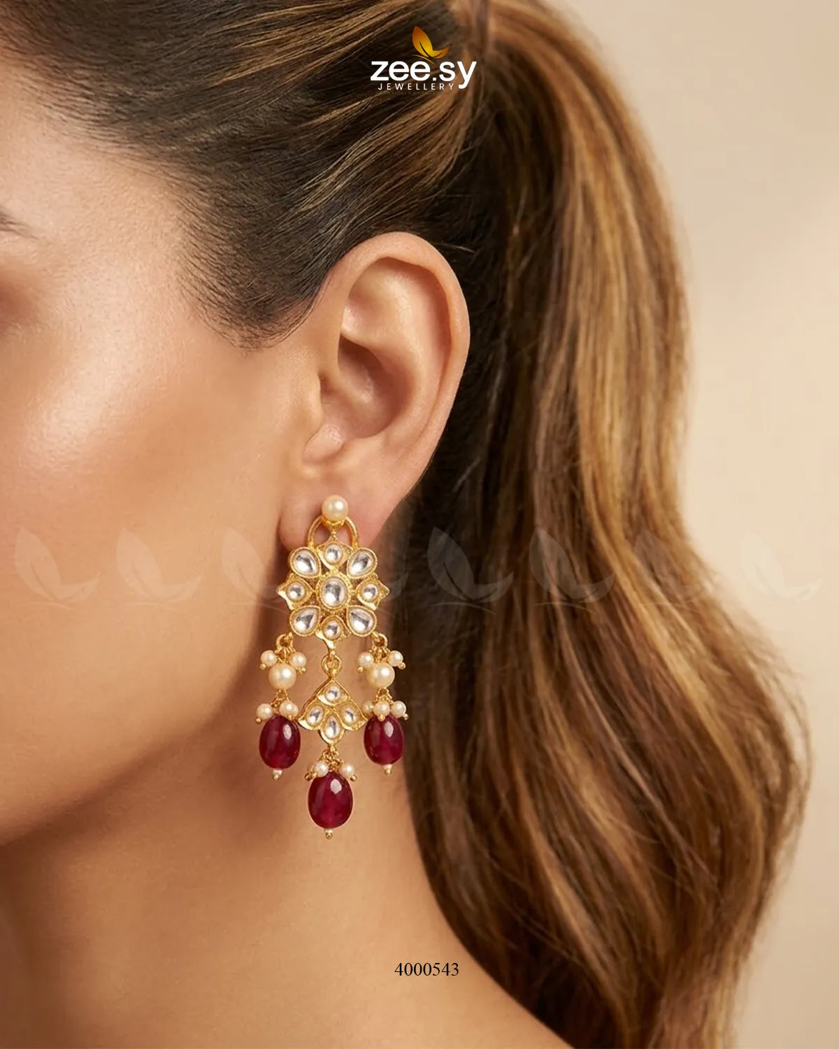 Gold-tone floral cluster pearl earrings by RHS09 featuring intricate design and dangling pearl accents.