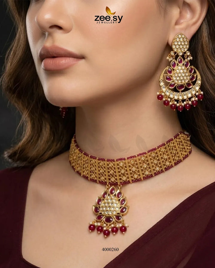 RHS09 Gleam Chandbali pearl choker set with ruby accents and matching earrings