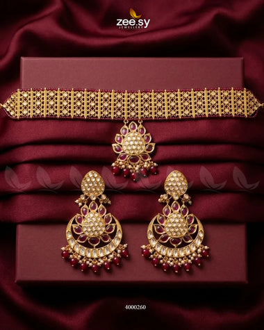 RHS09 Gleam Chandbali pearl choker set with ruby accents and matching earrings