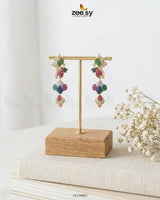 RHS09 golden flower dangler cluster earrings featuring intricate floral designs and elegant dangling elements.