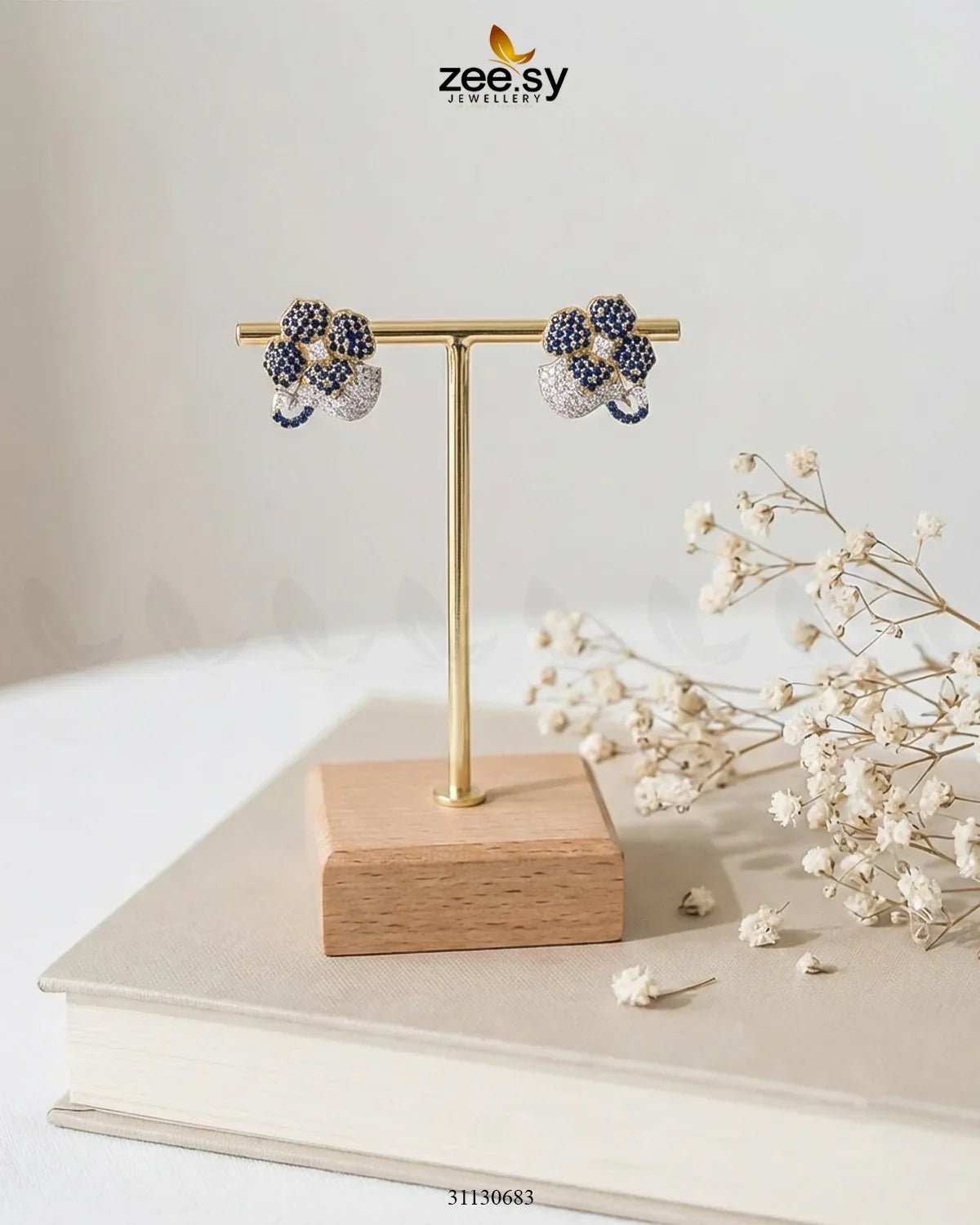 Golden sapphires and floral crystals adorn RHS09 earrings, showcasing intricate design and elegant sparkle.