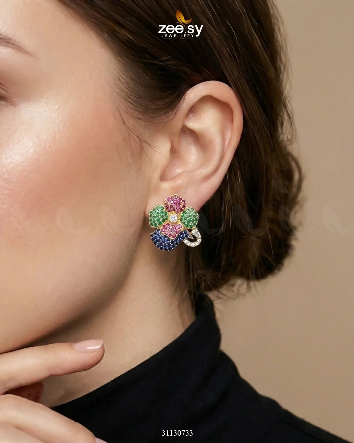 Golden sapphires and floral crystals adorn RHS09 earrings, showcasing intricate detailing and elegant design.