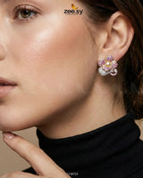 Golden sapphires and floral crystals adorn RHS09 elegant earrings, showcasing intricate design and sparkling details.