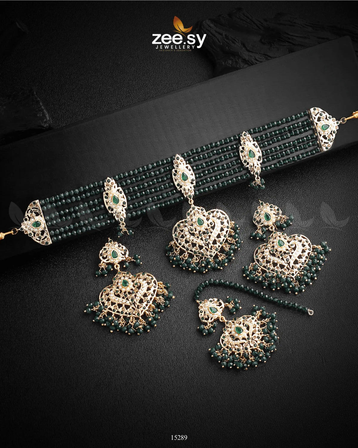 Add some South Indian sparkle to your look with Hyderabadi Guluband by zeesy jewellery! This eye-catching bracelet features brightly coloured stones in an intricate pattern, guaranteed to make you stand out in a crowd. Perfect for parties or special occasions, it's a must-have accessory to show your unique style!