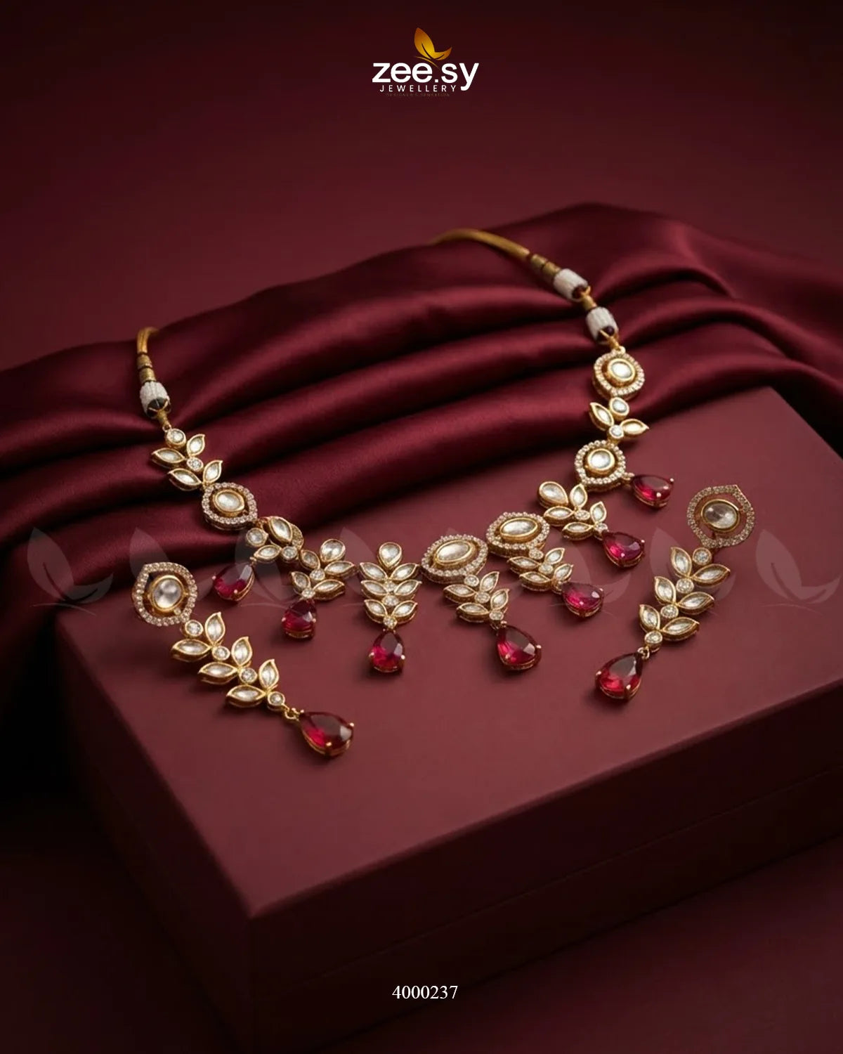 Red Jasper Droplet Polki Necklace Set with matching earrings, featuring intricate gemstone detailing and traditional design.