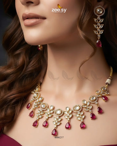 Red Jasper droplet Polki necklace set featuring intricate jewelry design with polished stones and traditional craftsmanship.