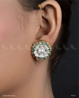 Juvela Earrings exquisite floral stud earrings are a perfect blend of elegance and sophistication. Embellished with dazzling American-cut diamond stones and radiant crystal glass stones, they offer a captivating shimmer. At the center, a lustrous pearl enhances their charm, adding a touch of grace. Available in multiple variants, these Stud earrings are ideal for any occasions.