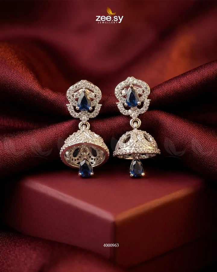 RHS09 ornate American diamond jhumka earrings in blue with intricate detailing