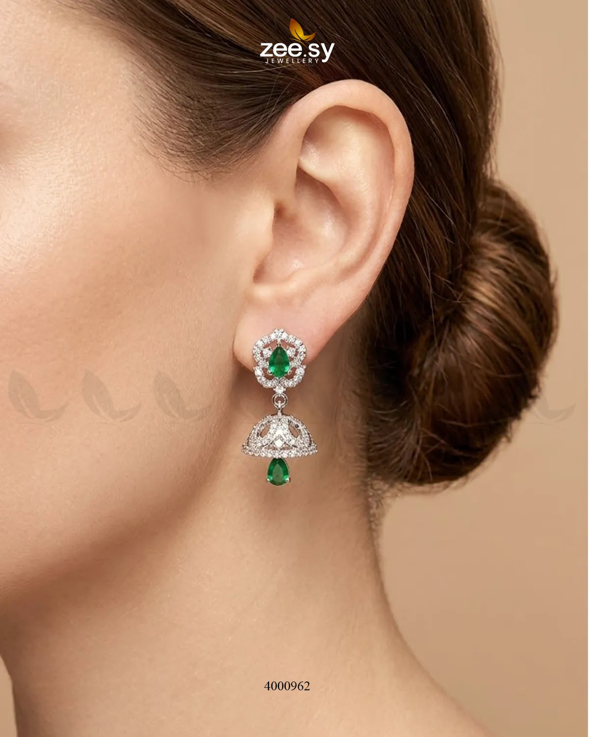 Ornate American diamond jhumka earrings with intricate design and dangling elements showcasing traditional craftsmanship.