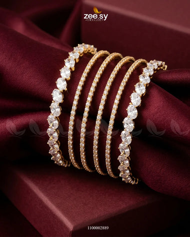 Oval Gemstone Paved Bangles Golden White Bangles - Zeesy Jewellery Pakistan | Premium Artificial & Imitation Jewellery