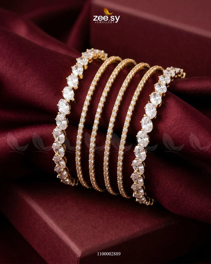 Oval Gemstone Paved Bangles Golden White Bangles - Zeesy Jewellery Pakistan | Premium Artificial & Imitation Jewellery