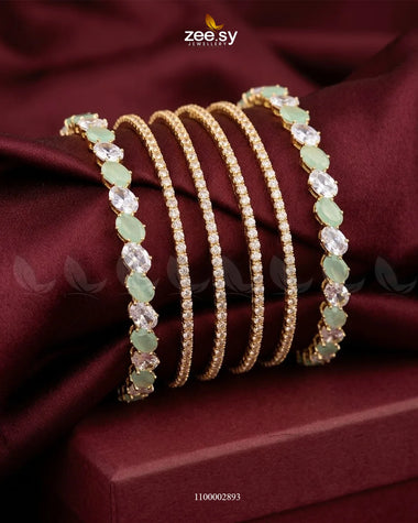 Mint green oval gemstone paved bangle by AJ03, elegant jewelry bracelet with sparkling gemstone details.
