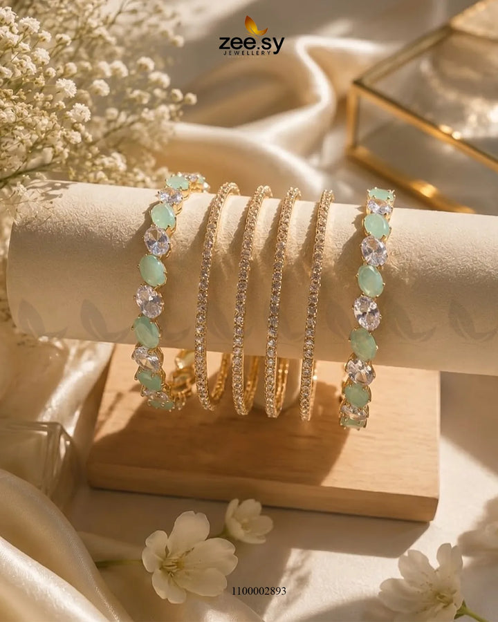 Mint green oval gemstone paved bangles from AJ03, featuring a stylish oval gemstone design and intricate paving details.