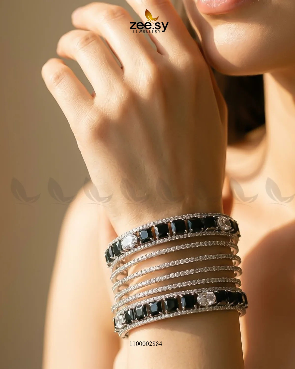 Silver princess cut zirconia bangle from AJ03 featuring sparkling gemstone accents and a sleek, elegant design.