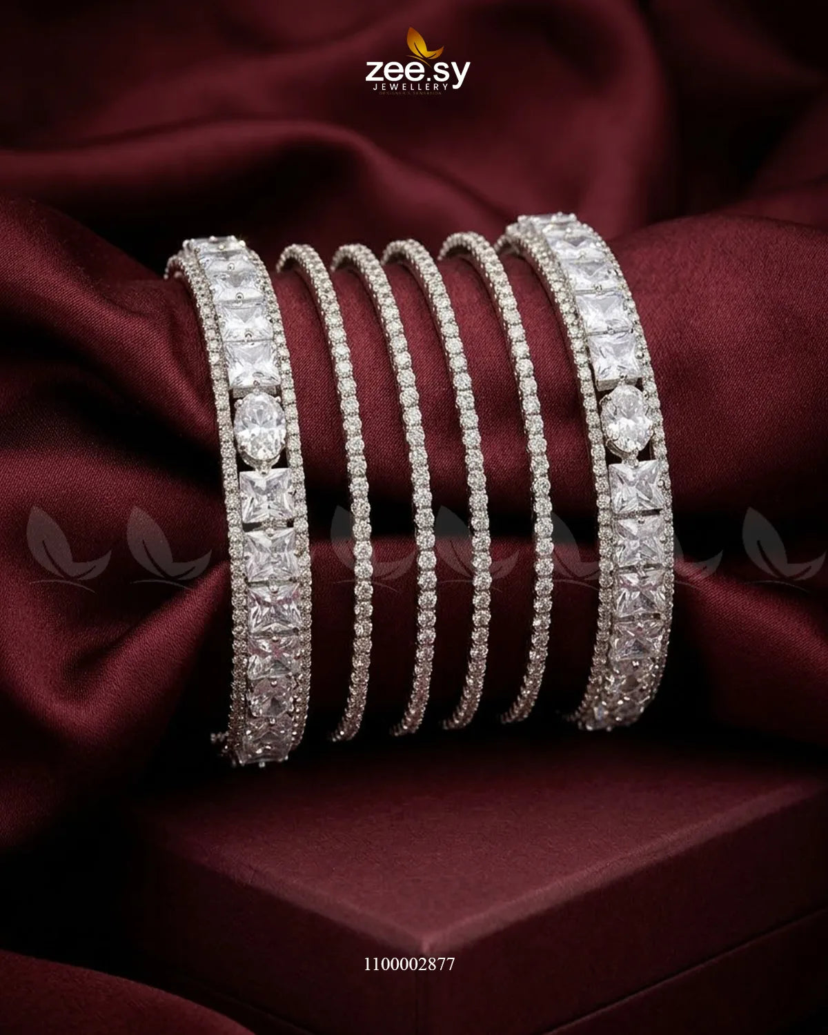 Silver princess cut zirconia bangle featuring sparkling stones, elegant jewelry accessory with AJ03 brand details.