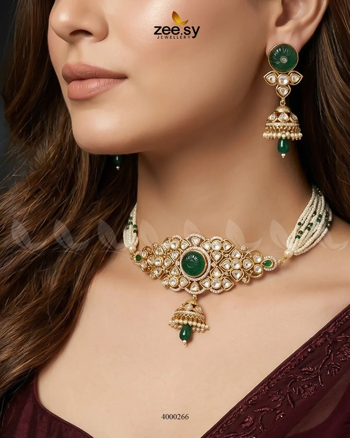 Green Radiance Pearl Jhumki choker set with intricate design and hanging pearl jhumkis, perfect for traditional occasions.